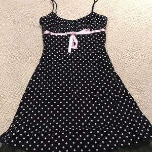 Very adorable polka dot dress with pink ribbon